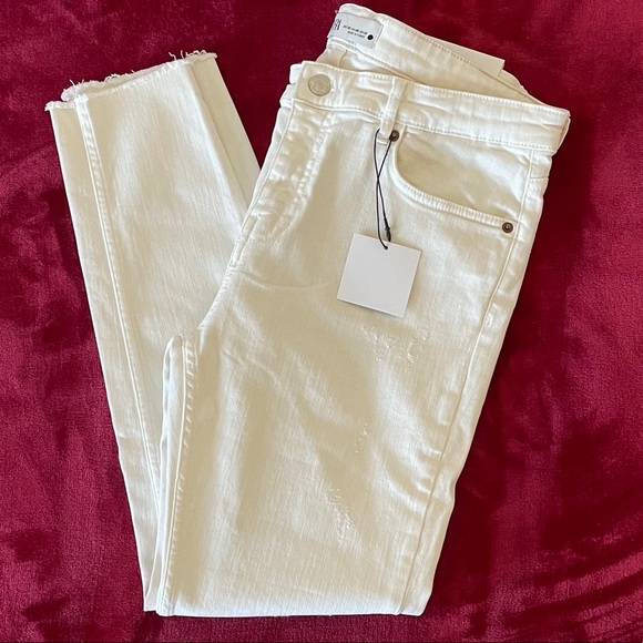 Zara the multidamage skinny in off white slim fit skinny leg mid rise jeans